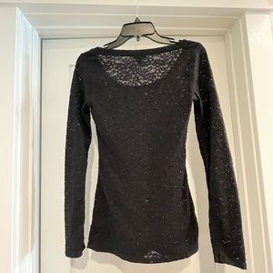 Express black eyelet lace shirt in XS. Excellent condition.